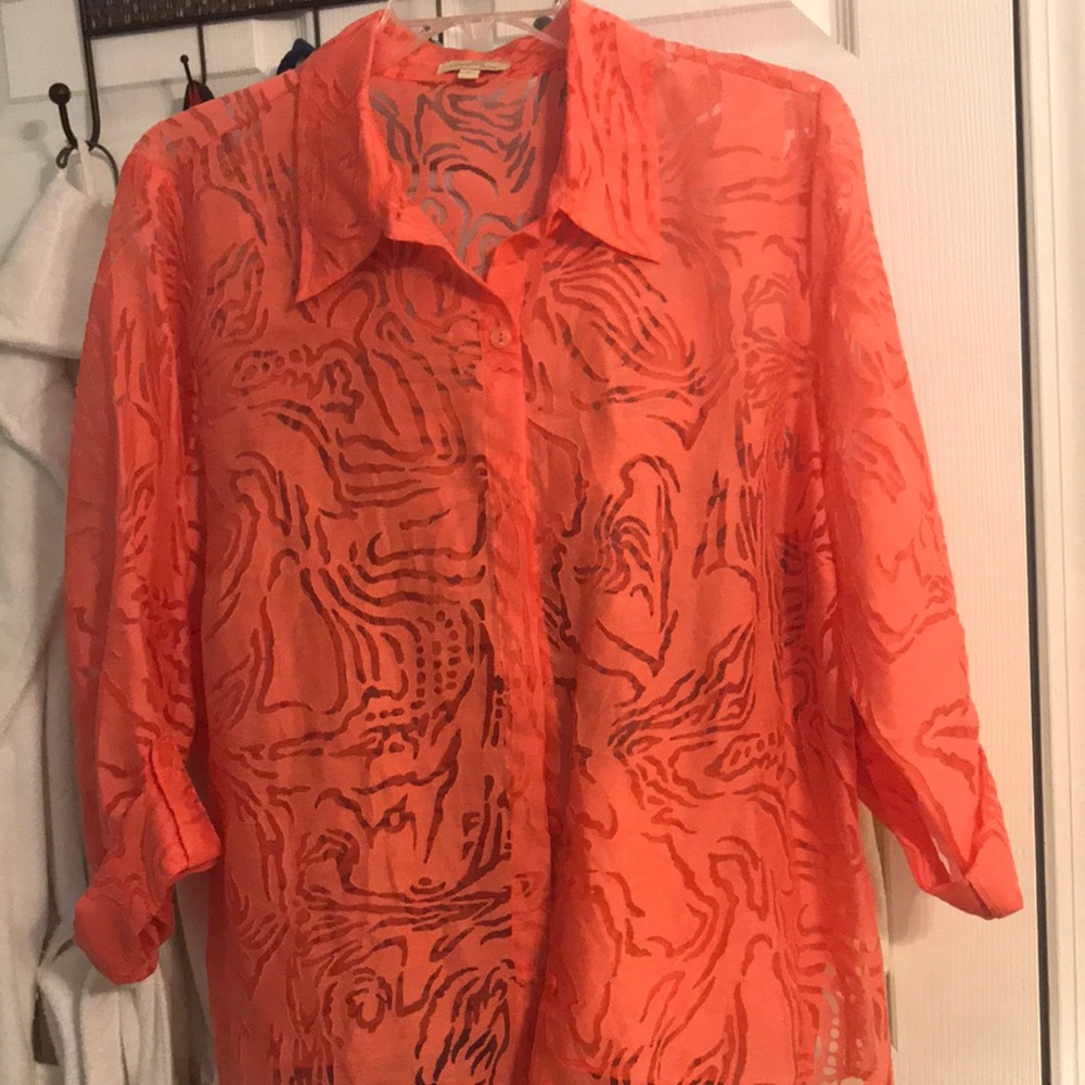 Stencil cut 3/4 length button sleeve shirt. Can be worn over tank top/T shirt